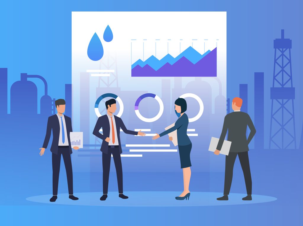 Business professionals shaking hands and discussing data analytics in an industrial setting.